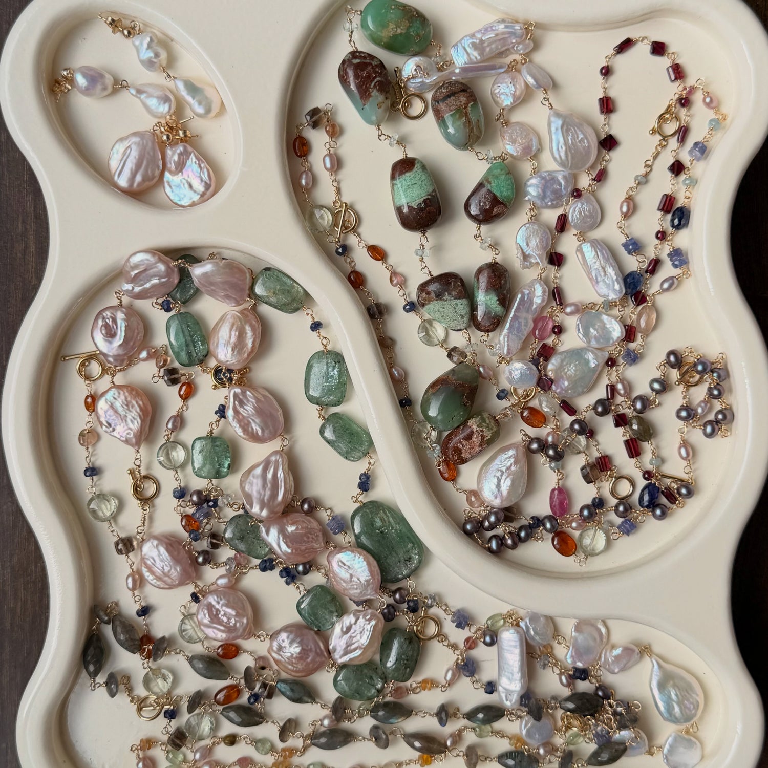 array of emily iris jewelry pieces